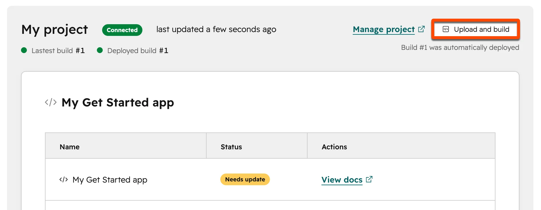 The upload and build button on the local dev panel page, which you can use to upload local changes to HubSpot